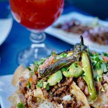 La Bonita's signature dishes Carne Asada TacosAl Pastor BurritoQuesadillasHorchata